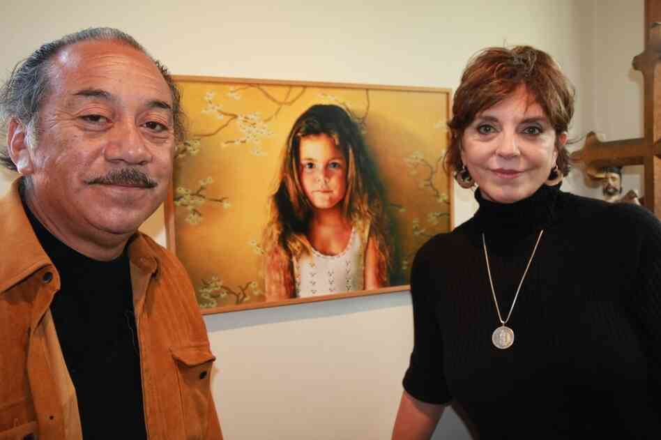 Jody and Reynaldo Terrazas stand in front of a painting of their oldest daughter. The Terrazases have lived in Oakland's San Antonio neighborhood for more than 40 years and raised two girls there. Jody and Reynaldo Terrazas stand in front of a painting of their oldest daughter. The Terrazases have lived in Oakland's San Antonio neighborhood for more than 40 years and raised two girls there.