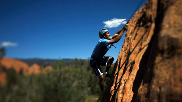 Iraq War veteran Tyler Daly goes rock climbing in Colorado. (NPR)