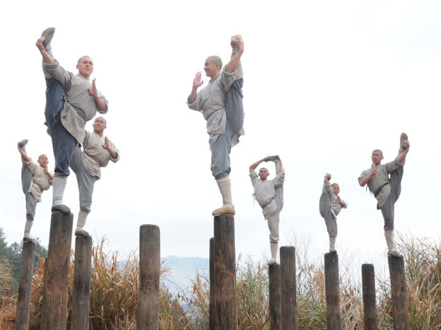 The temple's monks pursue a rigorous regimen of physical and mental training — but some leaven it with an irrepressible humor.