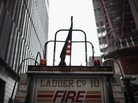 A firetruck is parked near the nearly completed Freedom Tower at the World Trade Center site in New York on Aug. 14. A firetruck is parked near the nearly completed Freedom Tower at the World Trade Center site in New York on Aug. 14.
