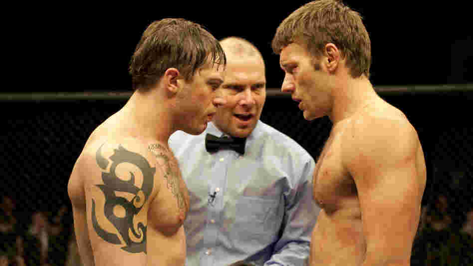 Tommy (Tom Hardy, left) and Brendan (Joel Edgerton) are battling brothers in Warrior — a domestic drama that feels surprisingly epic. Tommy (Tom Hardy, left) and Brendan (Joel Edgerton) are battling brothers in Warrior — a domestic drama that feels surprisingly epic.