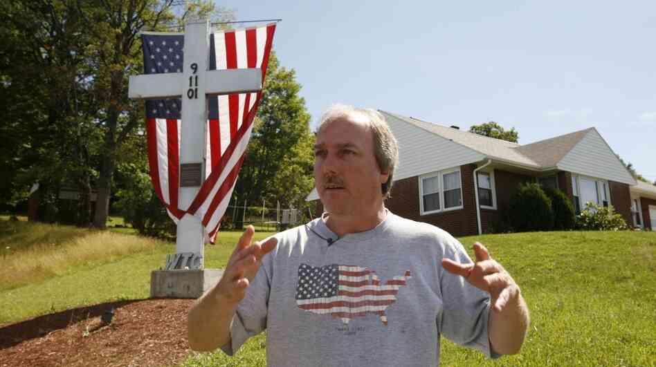 Rick King, who was assistant fire chief of Shanksville, Pa., on Sept. 11, 2001, stands near a cross made from steel from the World Trade Center, outside the fire station in Shanksville on July 14. He was one of nine people to tell NPR what Sept. 10 was like, the day before the horrible events of Sept. 11. Rick King, who was assistant fire chief of Shanksville, Pa., on Sept. 11, 2001, stands near a cross made from steel from the World Trade Center, outside the fire station in Shanksville on July 14. He was one of nine people to tell NPR what Sept. 10 was like, the day before the horrible events of Sept. 11.