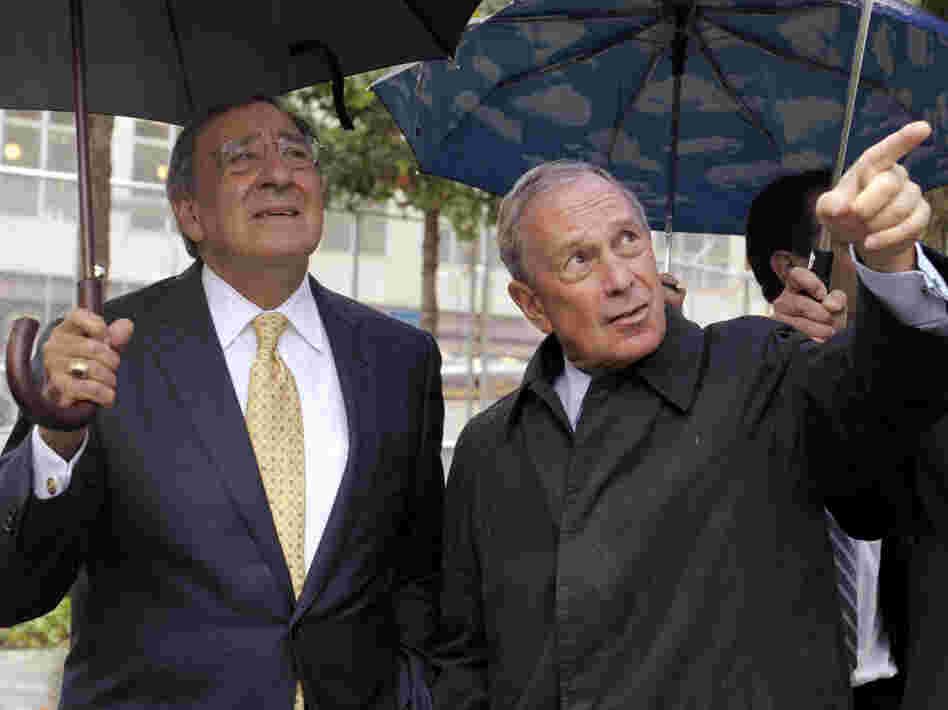 New York City Mayor Michael Bloomberg (right) shows Panetta the World Trade Center Memorial.