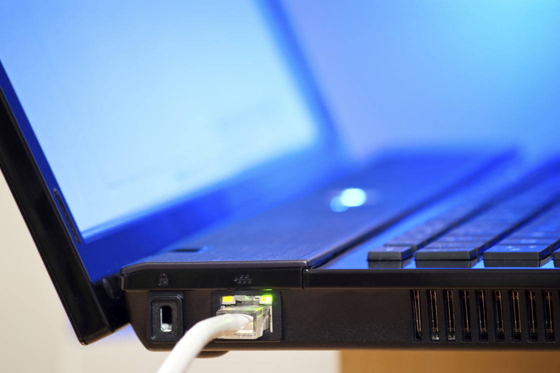 Comcast has started offering Internet access for $9.95 per month for low-income families, in addition to an optional voucher to let families buy a computer for $150.