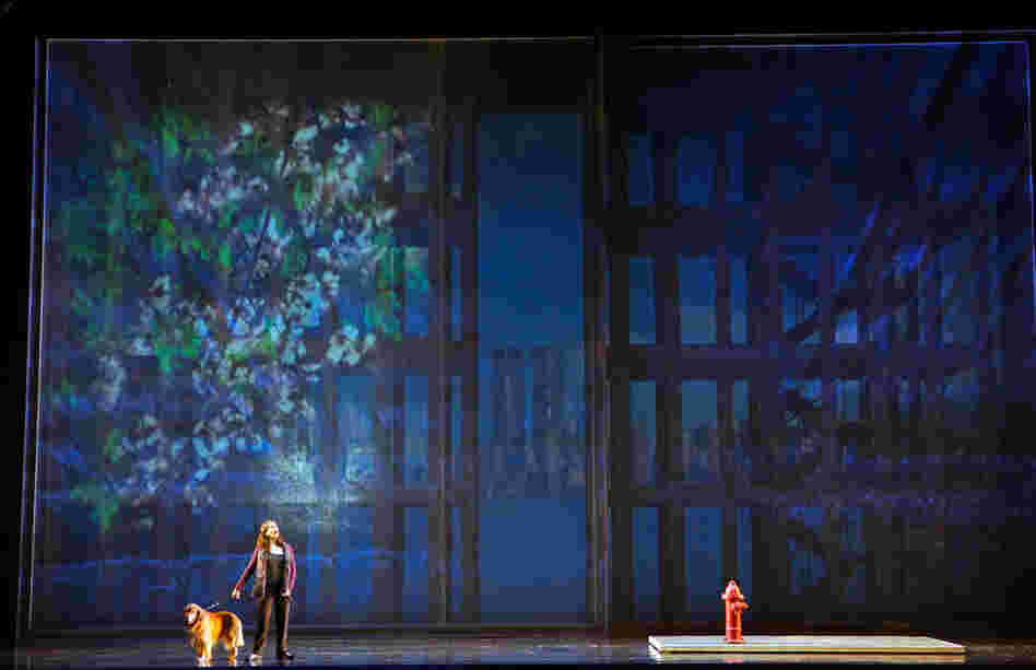 Melody Moore, as Susan, walks her dog, and will soon meet her future husband, Rick Rescorla.