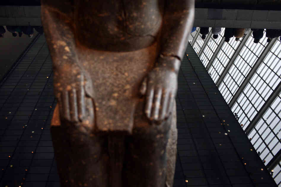 Looking into the reflecting pool, at the Remembering September 11 Wordless Music Orchestra concert conducted by Ryan McAdams at The Temple of Dendur at The Metropolitan Museum of Art in Manhattan, NY on September 11, 2011.