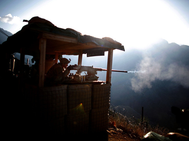 Pfc. Natan Martinez fires a machine gun from a position near the Pakistan border in Afghanistan. There is concern in Pakistan about the U.S. preserving a security presence in Afghanistan beyond 2014, the deadline to pull out most if not all U.S. combat troops.