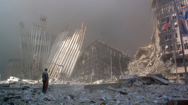 A man standing in rubble shouts to see if anyone needs help after the collapse of the first World Trade Center Tower in New York on Sept. 11, 2001. A man standing in rubble shouts to see if anyone needs help after the collapse of the first World Trade Center Tower in New York on Sept. 11, 2001.