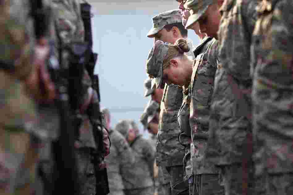 U.S. soldiers pray at an anniversary ceremony at Bagram Air Field in Afghanistan. 