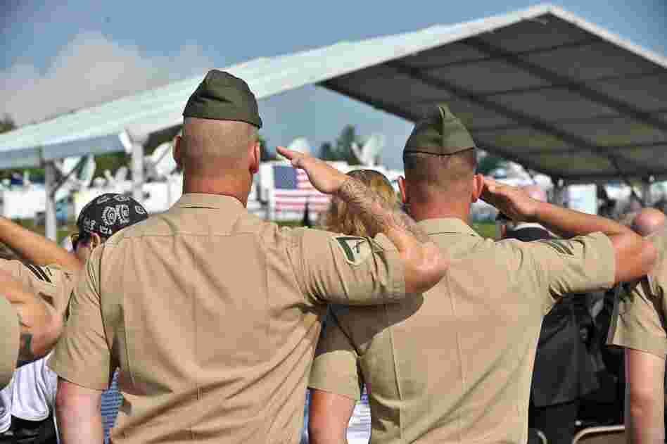 U.S. Marines salute during a ceremony in Shanksville, Pa. 