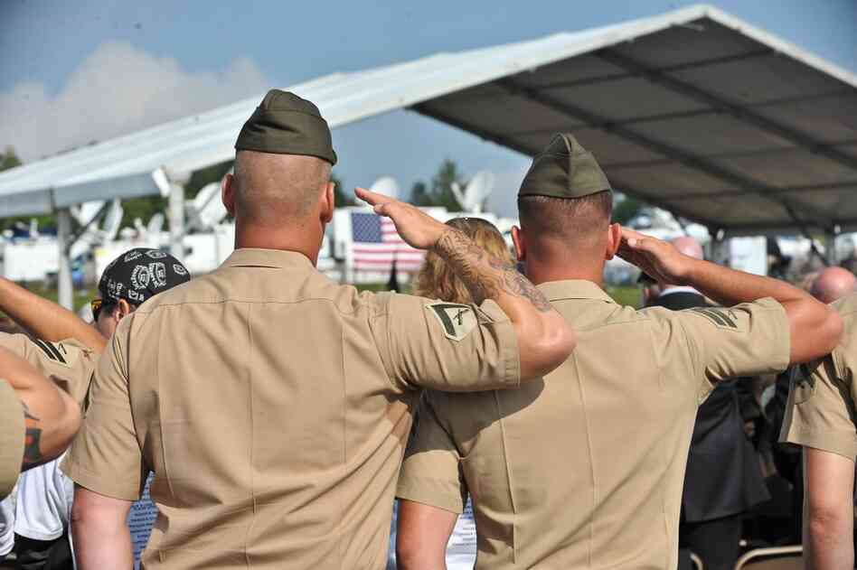 U.S. Marines salute during a ceremony in Shanksville, Pa. 