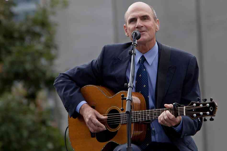 James Taylor performs at the site of the World Trade Center. 