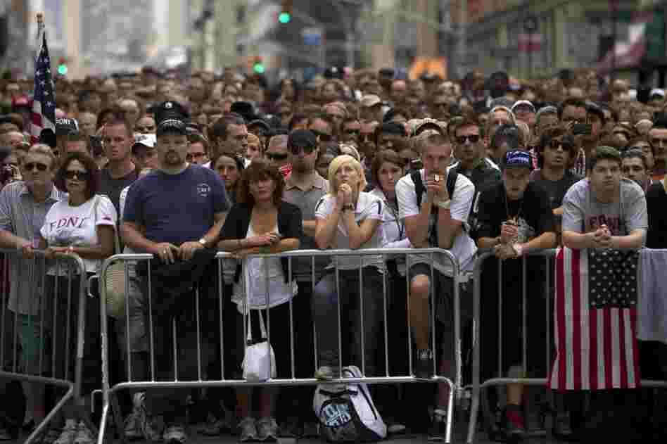 People gather outside the World Trade Center site in New York City. 