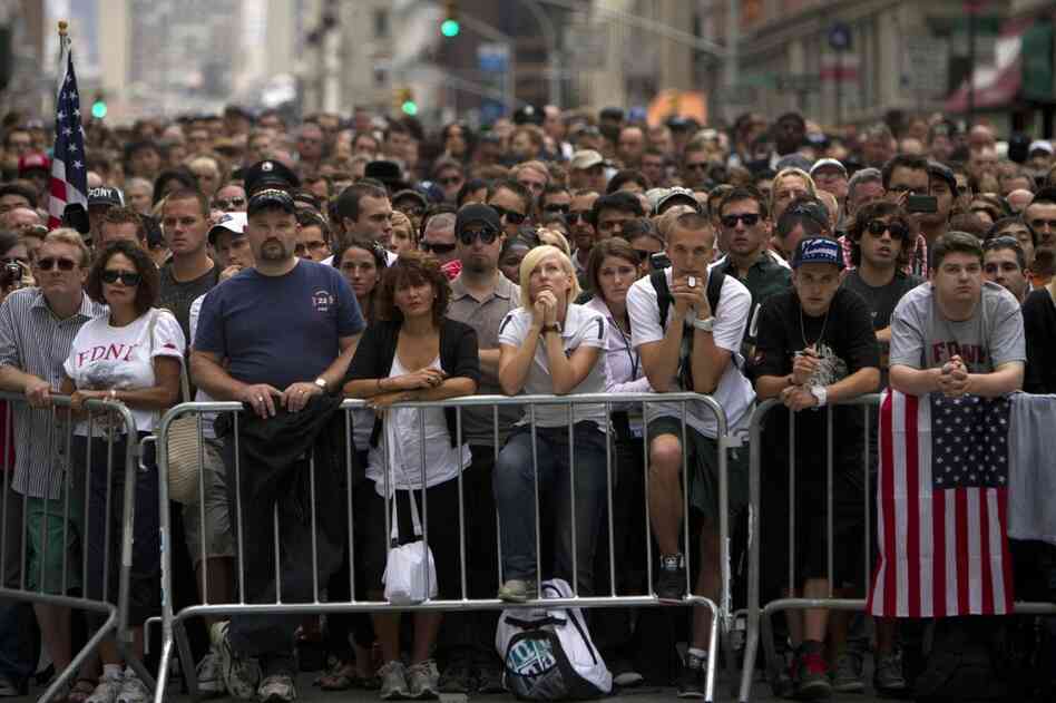 People gather outside the World Trade Center site in New York City. 
