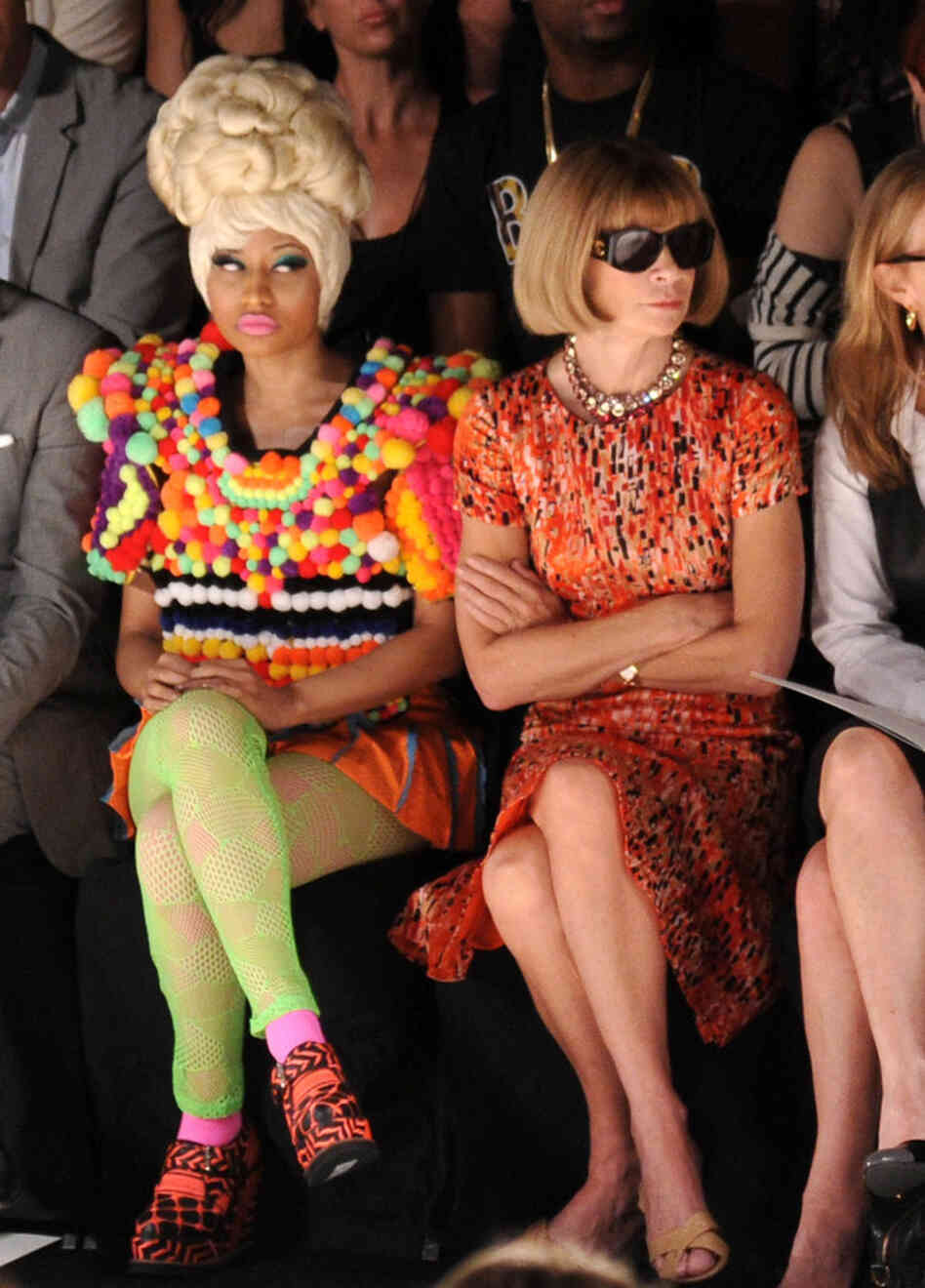 Rapper Nicki Minaj (L) and Editor-in-chief of American Vogue Anna Wintour attend the Carolina Herrera Spring 2012 fashion show during Mercedes-Benz Fashion Week.