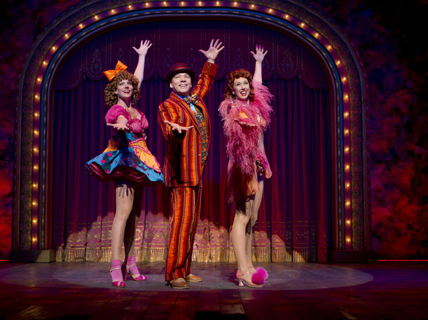 Blue Man, Grouped: Buddy Plummer (Danny Burstein, with Jenifer Foote and Kiira Schmidt) gets to bust loose at last with "Buddy's Blues" in the show's final sequence, known as Loveland.