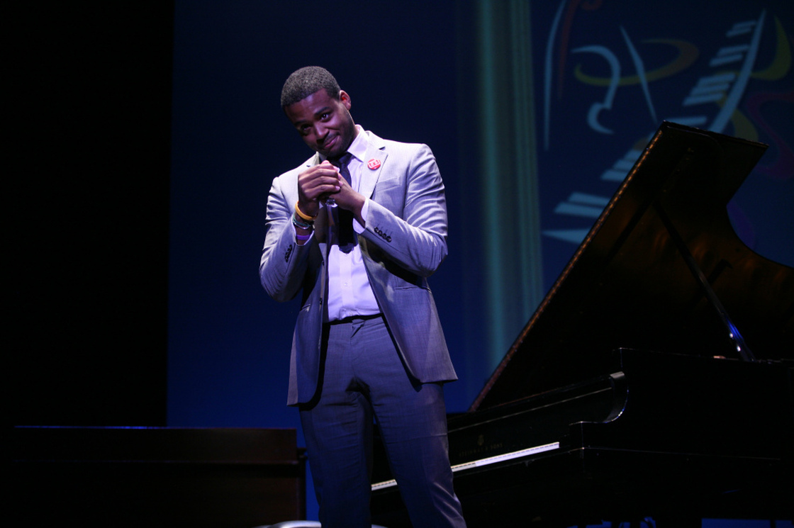 Kris Bowers bows to the audience after performing in the Thelonious Monk International Jazz Piano Competition. He took home first prize.
