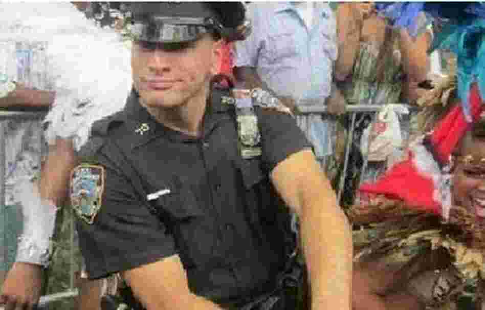 A New York City police man seen dancing in a video.