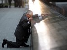 Robert Peraza, who lost his son Robert David Peraza, pauses at his son's name at the North Pool of the 9/11 Memorial at the site of the World Trade Center. Robert Peraza, who lost his son Robert David Peraza, pauses at his son's name at the North Pool of the 9/11 Memorial at the site of the World Trade Center.