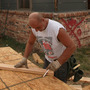 Anthony Owens (right) repairs the roof of a tornado-damaged home with James Davis (left) and Dwain Payne on July 30 in Joplin, Mo. All three men came up from Mobile, Ala., looking for work after the May 22 tornado that devastated Joplin, killing 160 people and destroying 7,500 homes and as many as 500 businesses. Anthony Owens (right) repairs the roof of a tornado-damaged home with James Davis (left) and Dwain Payne on July 30 in Joplin, Mo. All three men came up from Mobile, Ala., looking for work after the May 22 tornado that devastated Joplin, killing 160 people and destroying 7,500 homes and as many as 500 businesses.