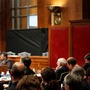 Ali Soufan testifies from behind a black curtain and a room divider to protect his identity in 2009, during a Senate hearing to examine the Bush administration's detention and interrogation program.