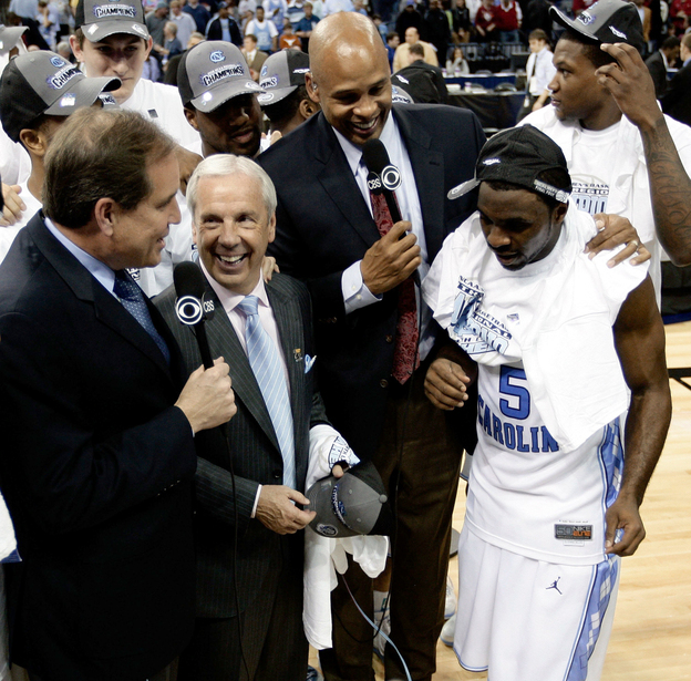 The NCAA lost control of college football contracts in the 1980s, forcing it to rely on fees paid to broadcast its annual basketball tournament. Here, CBS broadcasters Jim Nantz, left, and Clark Kellogg interview North Carolina coach Roy Williams and player Ty Lawson after a 2009 game.