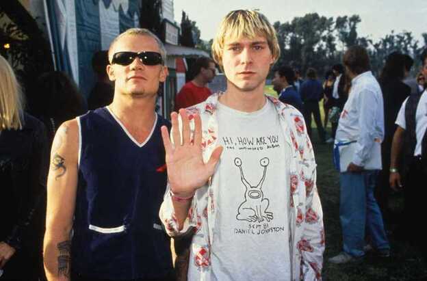 Nirvana's Kurt Cobain (right), pictured with Flea, wears a Daniel Johnston T-shirt at the 1992 MTV Video Music Awards.