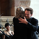 Wordless Music Orchestra conductor Ryan McAdams gives composer William Basinski a hug after the concert. Wordless Music Orchestra conductor Ryan McAdams gives composer William Basinski a hug after the concert.