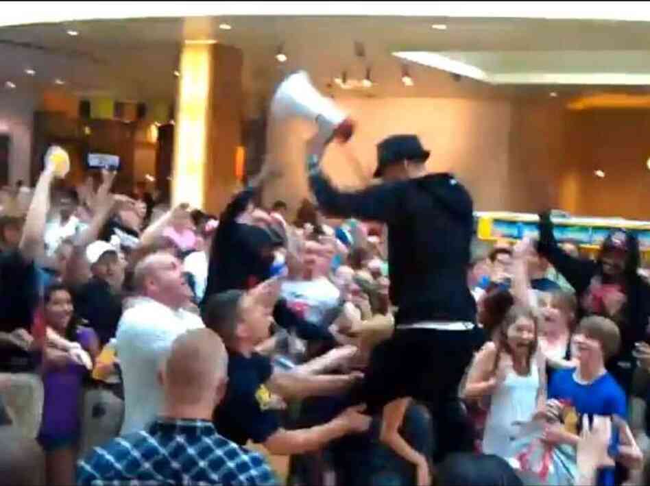 Police arrested rapper Colson Baker, also known as Machine Gun Kelly, when he refused to get off a table during a flash mob event at a mall in Ohio. Police arrested rapper Colson Baker, also known as Machine Gun Kelly, when he refused to get off a table during a flash mob event at a mall in Ohio.