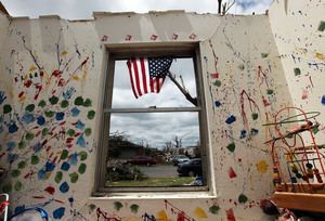 A child's room is seen in a destroyed home after the tornado passed through Joplin on May 26. The city's residents are still coping with losses from the storm, which damaged or destroyed an estimated 8,000 structures. A child's room is seen in a destroyed home after the tornado passed through Joplin on May 26. The city's residents are still coping with losses from the storm, which damaged or destroyed an estimated 8,000 structures.