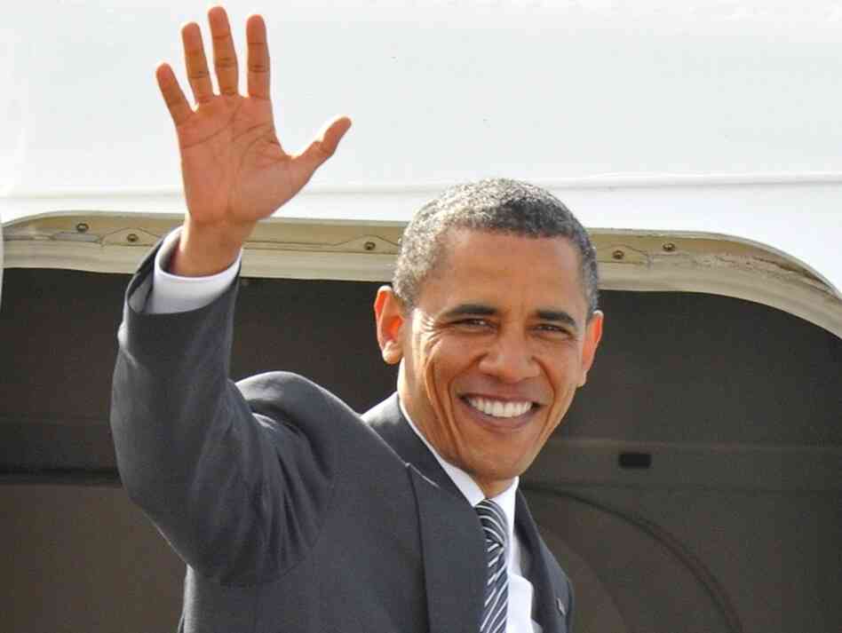 President Barack Obama waves as he boards Air Force One at Stansted Airport, May 26, 2011 near London, England. President Barack Obama waves as he boards Air Force One at Stansted Airport, May 26, 2011 near London, England.