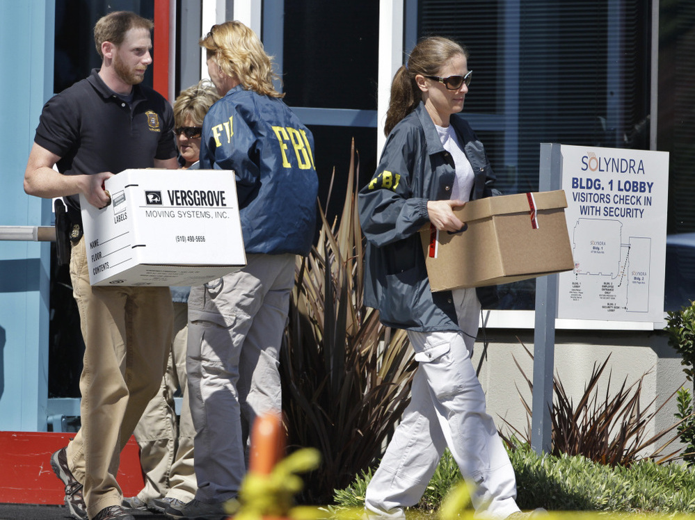 FBI agents remove evidence from Solyndra headquarters in Fremont, Calif., Sept. 8, 2011.