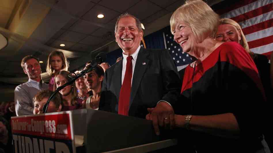 Bob Turner, center, joined by his wife Peggy, right, and family smiles as he delivers his victory speech during an election night party in New York. Turner says his shocking win in a heavily Democratic New York City district is a "loud and clear" message to Washington. Bob Turner, center, joined by his wife Peggy, right, and family smiles as he delivers his victory speech during an election night party in New York. Turner says his shocking win in a heavily Democratic New York City district is a "loud and clear" message to Washington.