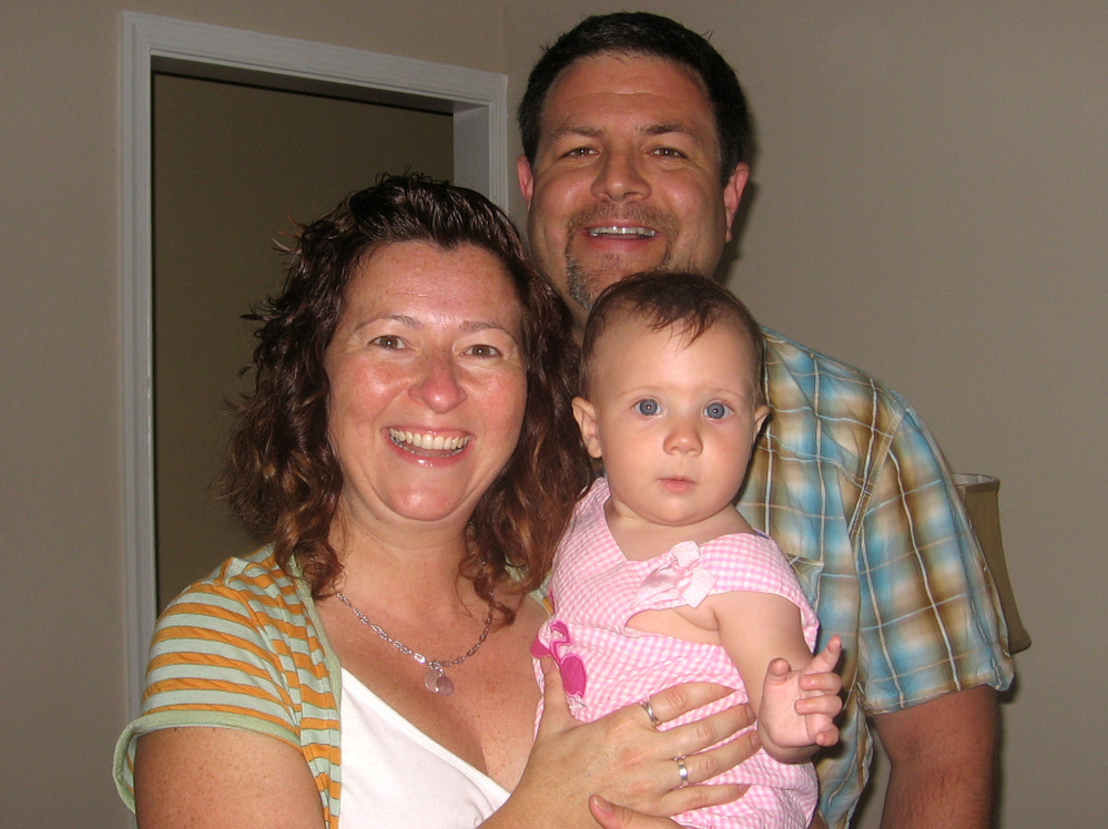 Tina and Patrick Gulbrandson, with their daughter, Waverly.