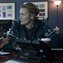 Laurence Fishburne as Dr. Ellis Cheever and Kate Winslet as Dr. Erin Mears in the thriller Contagion. Winslet's character was modeled on CDC epidemiologist Dr. Anne Schuchat.