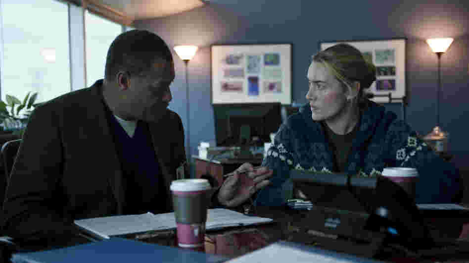 Laurence Fishburne as Dr. Ellis Cheever and Kate Winslet as Dr. Erin Mears in the thriller Contagion. Winslet's character was modeled on CDC epidemiologist Dr. Anne Schuchat.