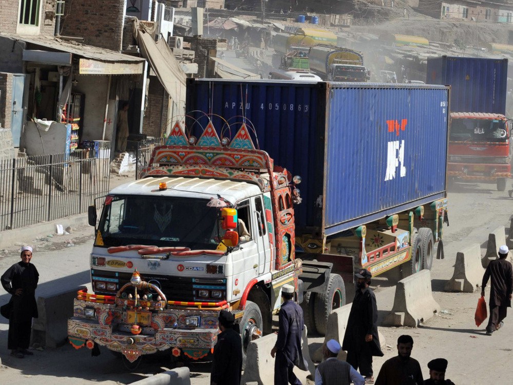 Trucks and tankers carrying supplies for NATO forces in Afghanistan arrive at the Pakistan's Torkham border crossing point before entering into Afghanistan in October 2010. The U.S. is increasingly relying on alternate routes that bypass Pakistan altogether.