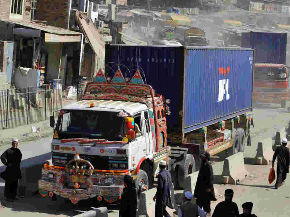 Trucks and tankers carrying supplies for NATO forces in Afghanistan arrive at the Pakistan's Torkham border crossing point before entering into Afghanistan in October 2010. The U.S. is increasingly relying on alternate routes that bypass Pakistan altogether.