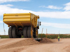 A large earth-mover carries PCB-contaminated soil from the Hudson River in New York to a burial pit at Waste Control Specialists near Andrews, Texas, in October 2009. A large earth-mover carries PCB-contaminated soil from the Hudson River in New York to a burial pit at Waste Control Specialists near Andrews, Texas, in October 2009.
