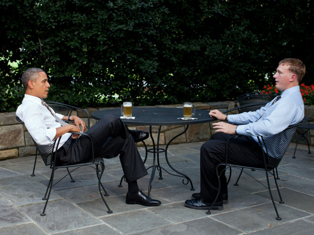 President Obama has a beer with Dakota Meyer on the patio outside of the Oval Office, Sept. 14, 2011.