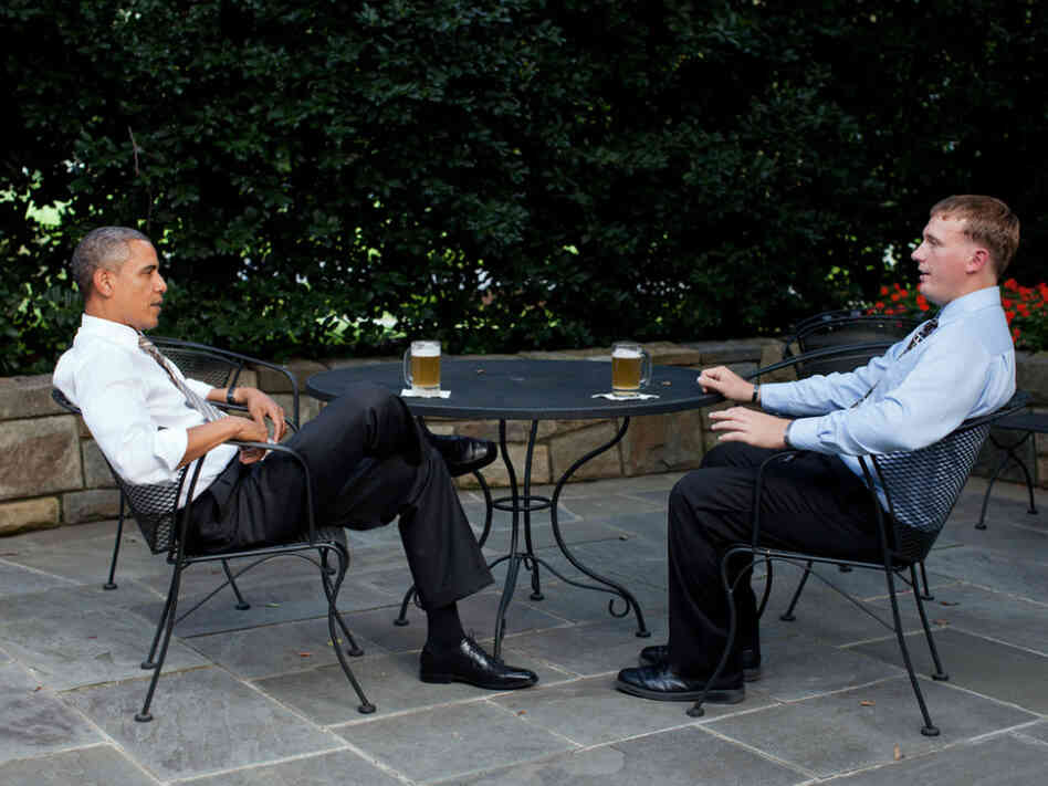 President Obama has a beer with Dakota Meyer on the patio outside of the Oval Office, Sept. 14, 2011.
