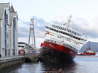 The MS Nordlys sits stricken in the water at Aalesund in western Norway. The MS Nordlys sits stricken in the water at Aalesund in western Norway.