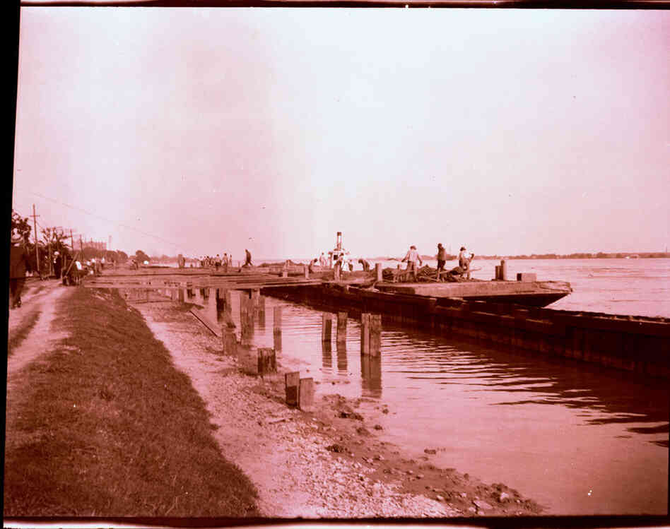 Repairing revetment at Carrollton.