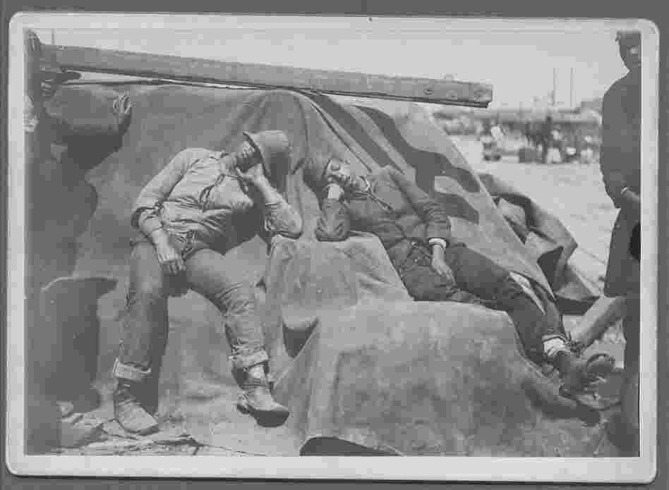 Dock workers sleep.