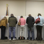 Voters cast their ballots in Idaho's general election last November. The state requires photo IDs to be presented at the polls. Voters cast their ballots in Idaho's general election last November. The state requires photo IDs to be presented at the polls.