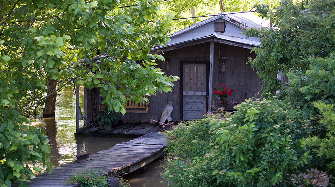 Occasional flooding is part of life on the batture, between the Mississippi River and the levee.