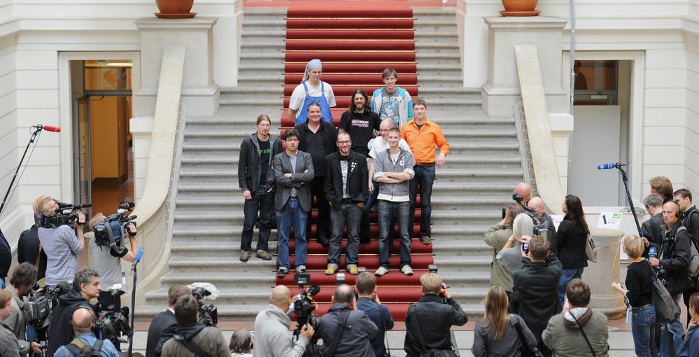 Deputies of the Pirate Party pose in the House of Representatives in Berlin today. Free wireless Internet and public transport; voting rights for over-14s are just some of the policies of the "Pirate Party."