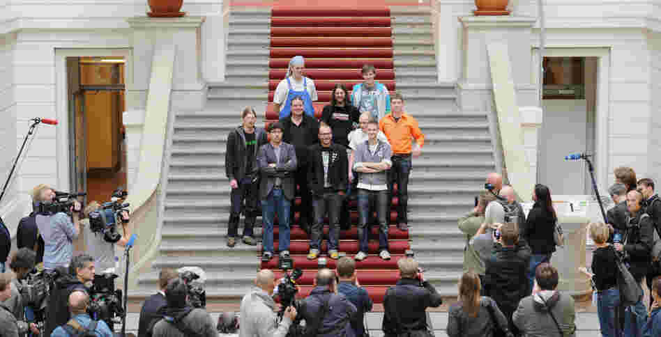 Deputies of the Pirate Party pose in the House of Representatives in Berlin today. Free wireless Internet and public transport; voting rights for over-14s are just some of the policies of the "Pirate Party."