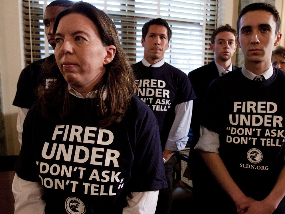 Stacy Vasquez was discharged from the military under the "don't ask, don't tell" policy. Now that the ban has been lifted, she says she is applying to re-enter the military. Vasquez is seen here in 2010 with other former service members (from left) Anthony Woods, David Hall and Todd Belok.