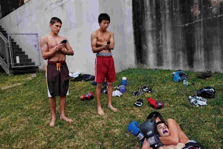 Bryan Campbell (left) and his friends gathered monthly to wrestle and box, often posting their videos to Facebook. Their fights delivered both excitement and social rewards.
